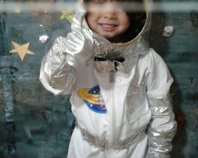 nursery child in space suit